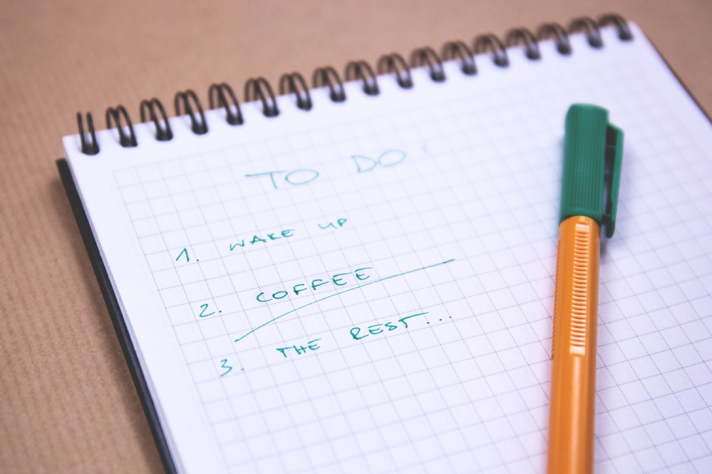 Handwritten to-do list in a notebook