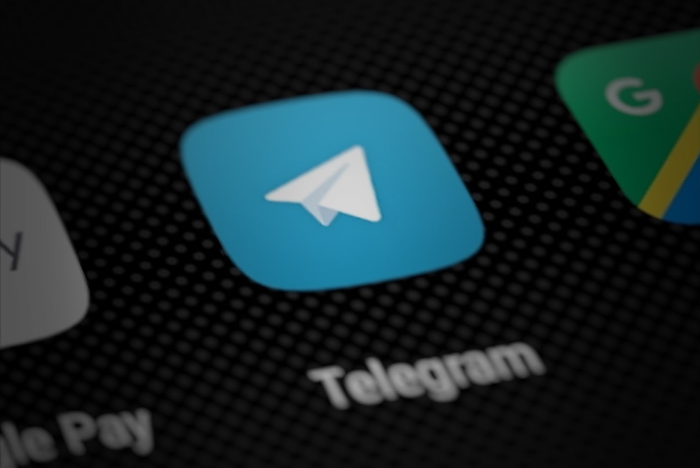 The Telegram app icon on a phone screen
